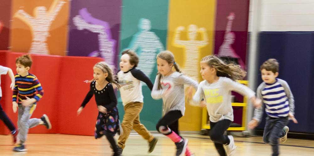 Kids running in the gym