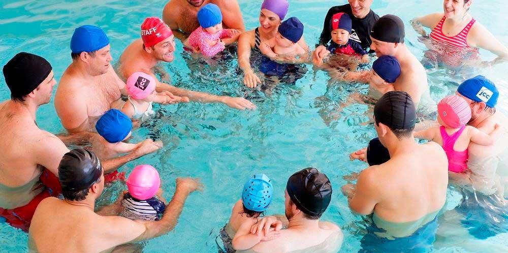 Parents and babies in the pool