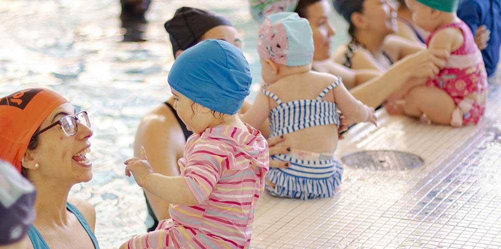 Parents and kids at the pool