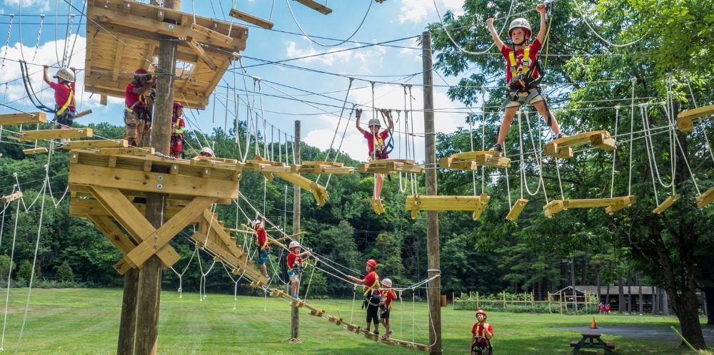 Kids playing on a rope course